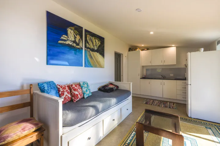 An Cala Onetangi Sleepout lounge area with kithcnette