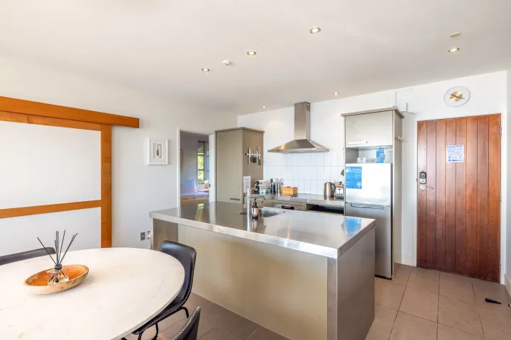 Apartment On The Beach Kitchen and Dining area