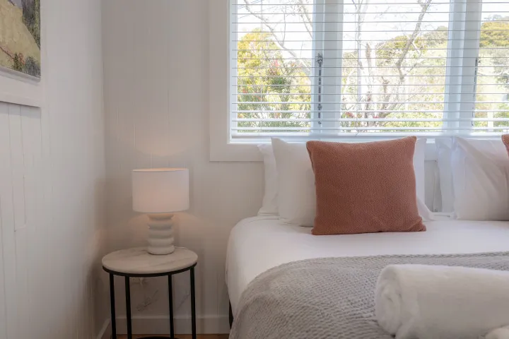Bedroom details at Tahatai Cottage