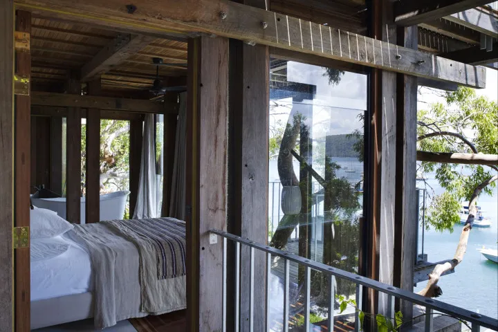 Spacious double bedroom with deck access and views of Palm Beach at Gaelforce luxury property NSW