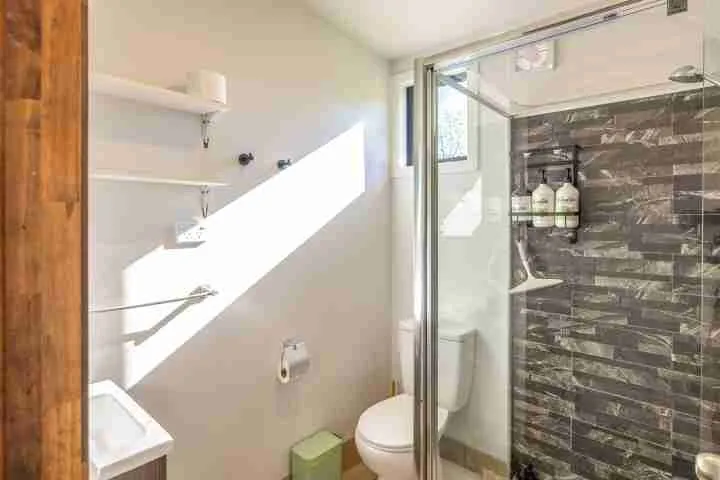 Harvest Cottage Waiheke Island Modern bathroom with shower and toilet