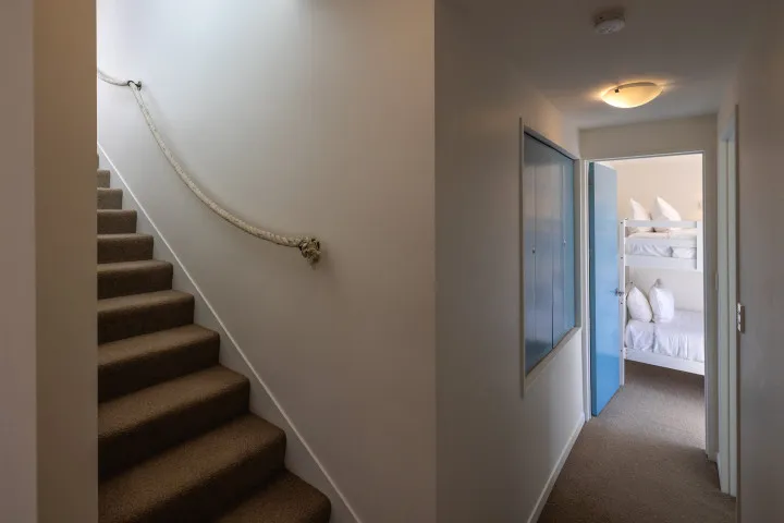 Hekerua Heights Internal staircase with nautical theme