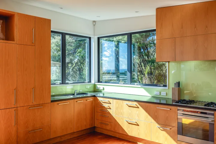 Hekerua Heights Modern kitchen with all appliances