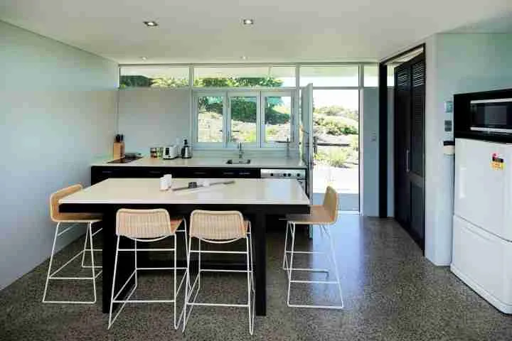 Guest house kitchen and dining area at luxury Waiheke Estate