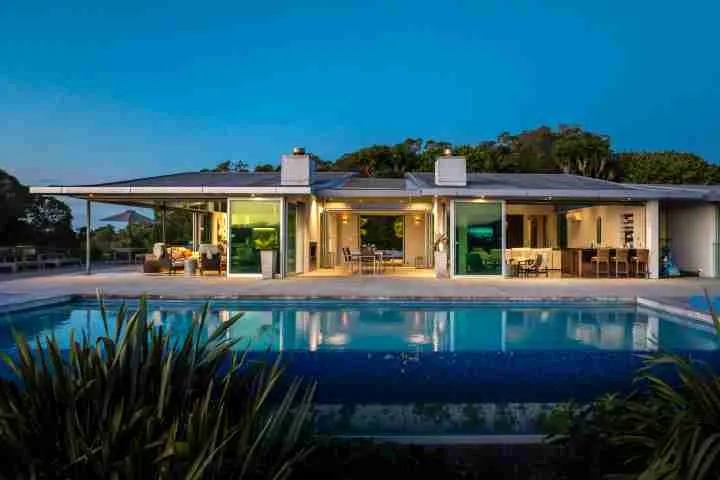 Korora Estate Exterior Dusk over swimming pool