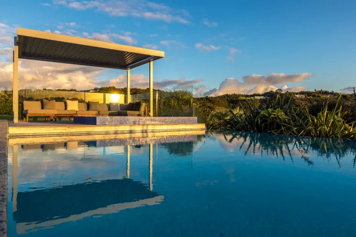 Korora Estate Sun reflecting in the glass at dusk