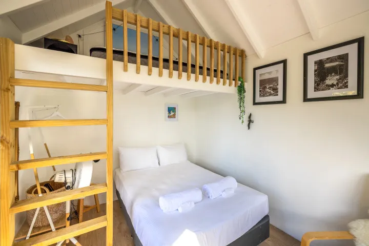 La Casa Al Mare Sleepout Area with double bed and fan