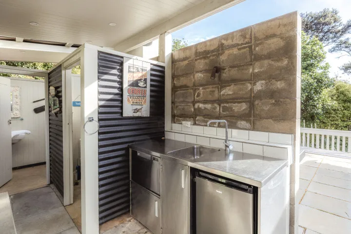 Outdoor kitchen and bathroom area The Boat House at Arran Bay