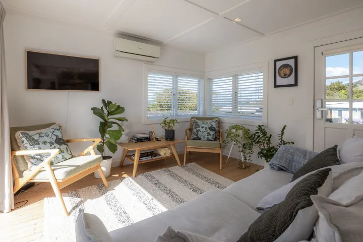 Plenty of lounge space at Tahatai Cottage