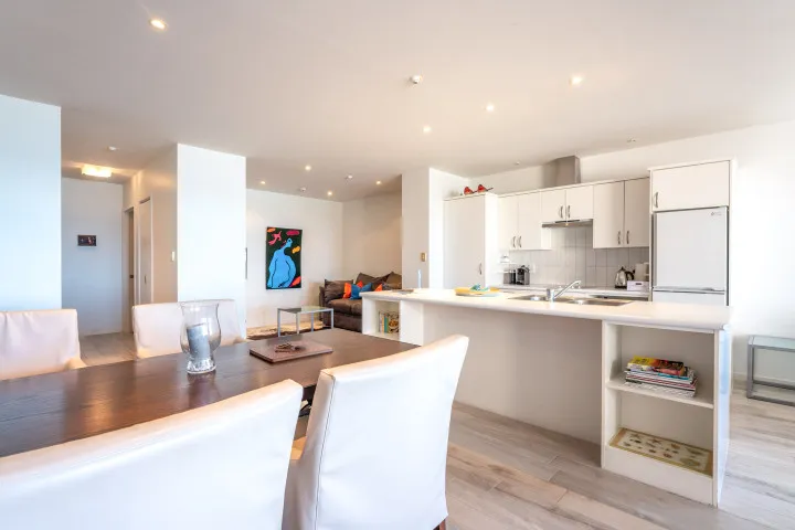Sunshine On The Beach Kitchen Island and Dining Area