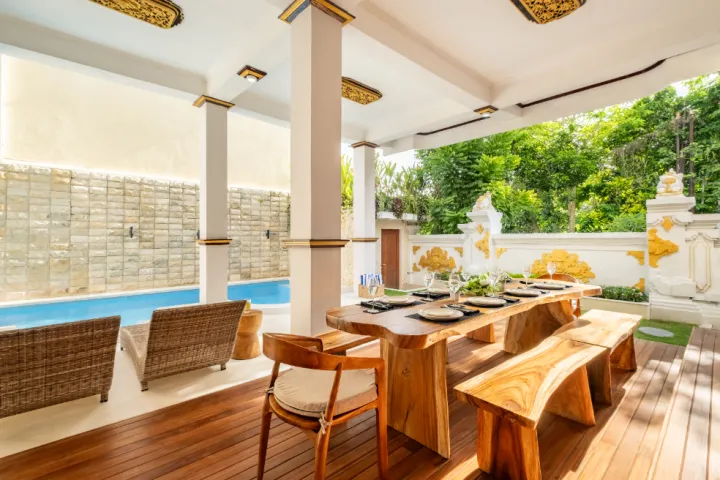 Swarna Mandapa Outdoor dining area looking back at the pool