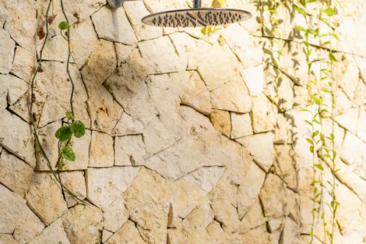 Swarna Mandapa Outdoor shower for use before and after using the pool