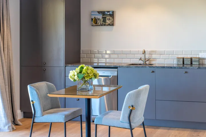 The Keep at Woodside Bay dining area and kitchenette