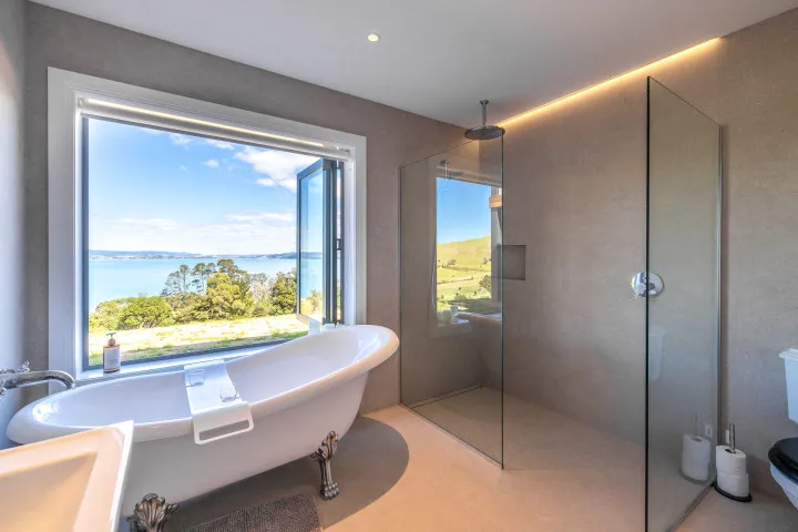 The Keep at Woodside Bay large family bathroom with bath and shower amazing views