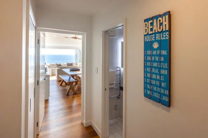 The Residence On The Beach at The Sands Entrance hall with wooden flooring throughout