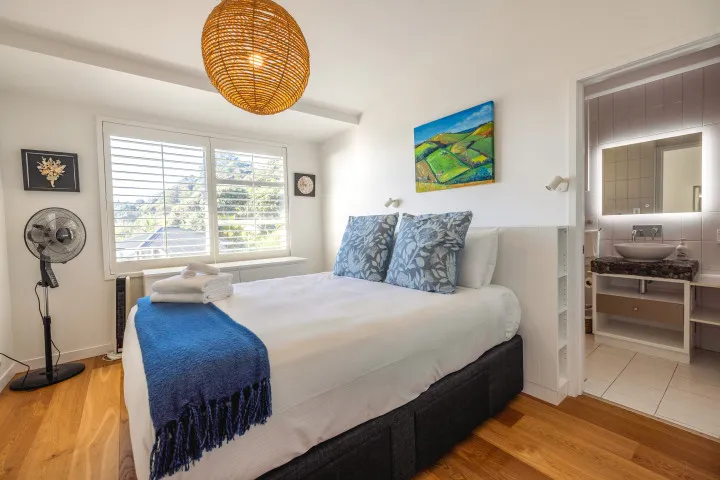 The Residence On The Beach at The Sands Master bedroom king bed with ensuite