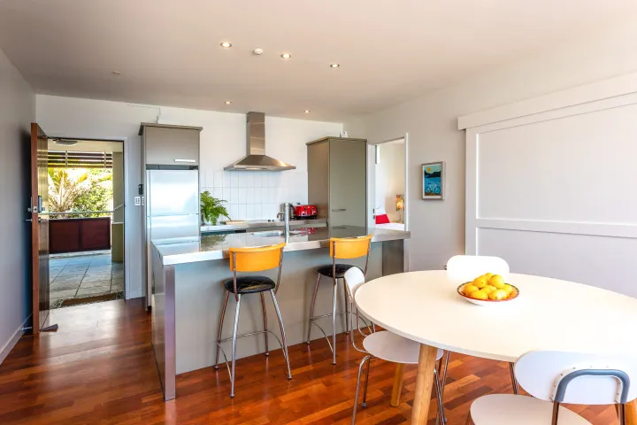 Vista On The Beach at The Sands Full kitchen with oven hob microwave and coffee machine