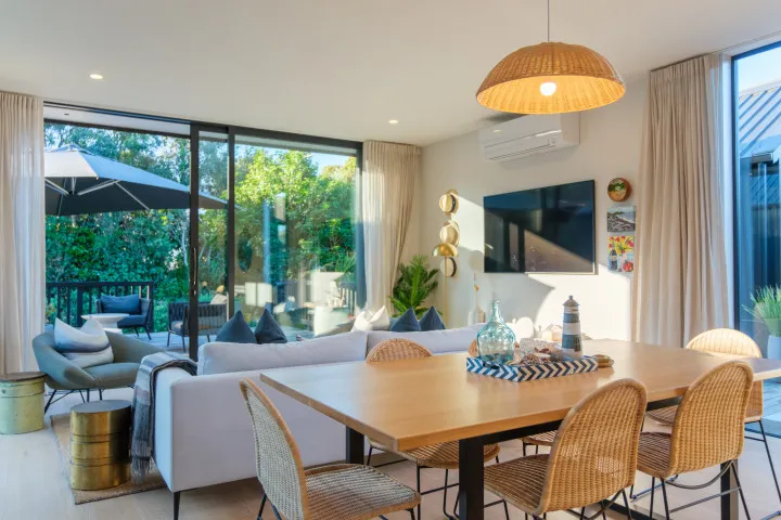 Waiata Beach House Dining area and lounge with smart TV v2