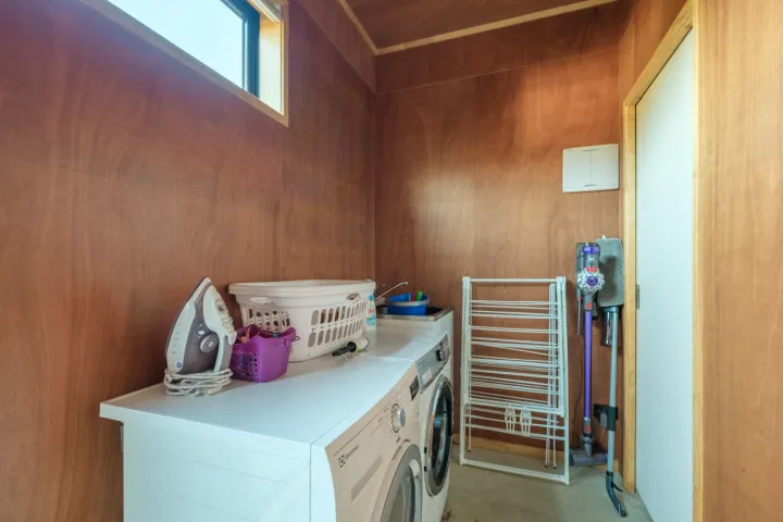 Waiata Beach House Laundry and cleaning area v2