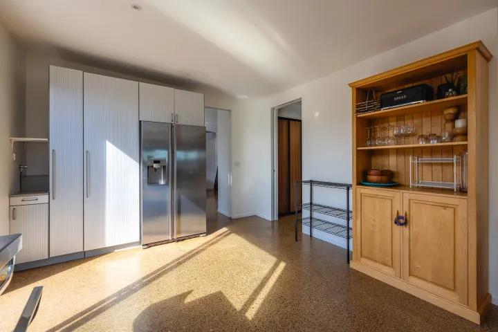 Wharetana Bay Villa Lots of pantry space coffee machine and large fridge freezer
