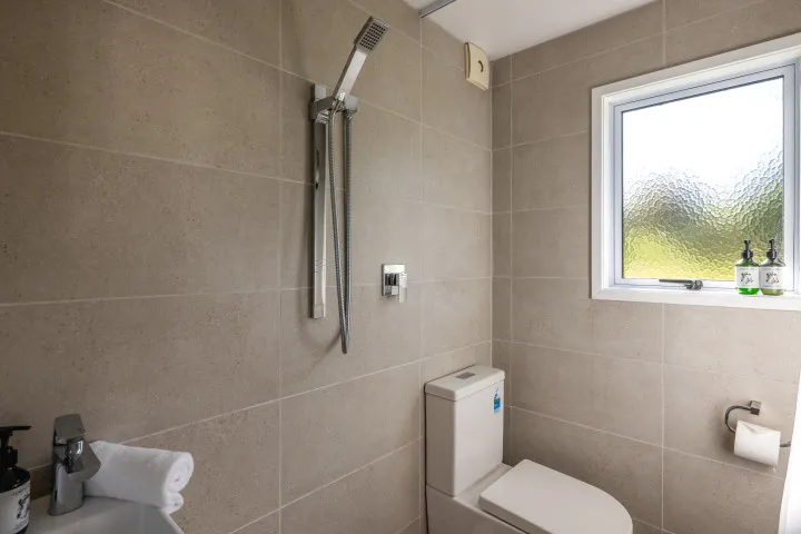 Wharetana Bay Villa Sleepout ensuite bathroom fully tiled